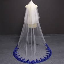 In many cultures, white wedding dresses are actually seen as faux pas. Two Tier Ivory Or White Wedding Veil With Royal Blue Sequined Lace Trim Blue Wedding Dress Royal Tulle Wedding Veil Royal Blue Lace