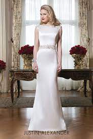 This neckline style together with a strapless design of a dress accentuates the neck, shoulders and arms of the bride, making a straight neckline wedding dress a favorite of athletic brides who want to show. Charmeuse Form Fitting Modern Wedding Dress With Beaded Waist Simple Elegant Wedding Dress Justin Alexander Wedding Dress Simple Wedding Gowns