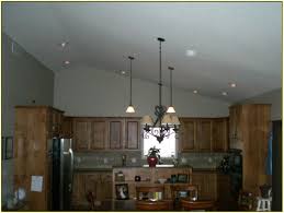 Most ceiling light fixtures are designed for a flat ceiling. Kitchen Lighting For Vaulted Ceilings Kitchen Lighting For Vaulted Ceilings Around Vaulted Ceiling Kitchen Sloped Ceiling Lighting Recessed Lighting Fixtures