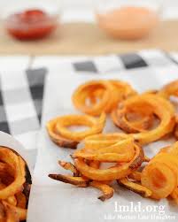 Next, slice the potato lengthwise into even slabs. Oven Baked Curly Fries Like Mother Like Daughter