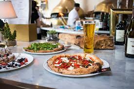 Come sit at the bar and watch your favorite sporting event while enjoying our game day food and drink specials or grab a table under our live olive tree with a glass of wine and watch the show in our open kitchen. Preston Hollow Pizzeria Schedules Opening Date People Newspapers