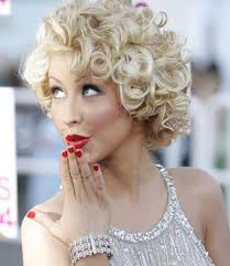 Her blonde locks were cut to shoulder length and heavily layered all over to enhance her curls and keep them in great shape. Short Curly Blond Hairstyles Novocom Top