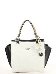 La légende guess, est née en 1981 de l'association des frères marciano. Epingle Sur Sac A Main Femme Blanc