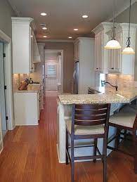 Galley kitchen remodel ideas with island. Galley Kitchen With Bar Possible Kitchen Update Kitchen Remodel Layout Kitchen Remodel Small Contemporary Kitchen