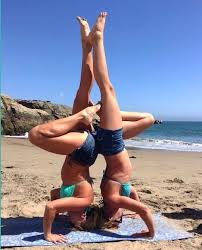 Partner Yoga Double Tripod Headstand Back To Back With Opposite Legs Straight Up And The Other Opposite Legs Bent With T Acro Yoga Partner Yoga Yoga Postures