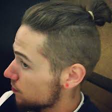 An Image Of A Young Guy With A Man Bun Undercut Hairstyle And A Short Boxed Beard In 2020 Man Bun Beard Man Bun Styles Man Bun Undercut
