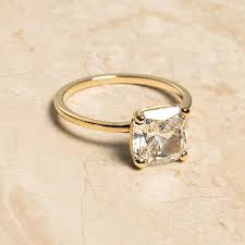 An engagement ring is a ring, usually adorned with diamonds, that is worn to indicate that a person is engaged to be married. 67 Gorgeous Engagement Rings Under 2 000