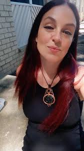 Copper pendant with tiger's eye and lotus flower