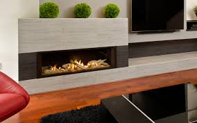 Are the fireplace front/surrounds usually framed with 2x4's on the sides and top, or are they just resting in place without any support behind? Valor L2 Linear Gas Fireplace Driftwood 1 Inch Surround Friendly Firesfriendly Fires