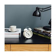 The milk vessel cools through a peltier cooler and is automatically activated by an infrared sensor when milk is present. Newgate Charlie Bell Echo Alarm Clock White Black By Design
