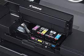 Push down the ink locking cover until it clicks into place. Inkstallation Guides How To Change A Canon Printer Ink Cartridge Inkcartridges Com Blog