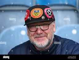London, UK, 29th April 2022. Dylan Springer (left) performs solo moves and  jumps with the rest of the cast. Performers during the photocall  run-through for the new Ockham's Razor show "Public", performing