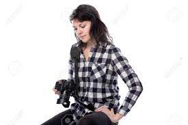 Young Female Art Student Holding A Dslr Camera And Studying To Be A  Professional Or Amateur Photographer. She Looks Creative And Inspired To  Become A Photo Journalist Stock Photo, Picture And Royalty