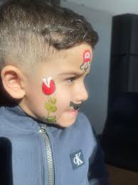 Cartizan Face Painting added a...