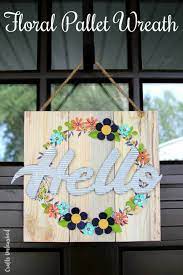 These darling farmhouse style diy hanging mason jar lights come from 17 apart. Cutest Diy Door Hangers Little Red Window