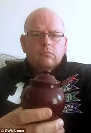 Bungling police raid wrong house while looking for wanted criminal and  accuse man of hiding drugs inside dead father's urn