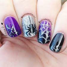Pick a shade for a perfectly spooky wondering what nail art to show off on camera this halloween? 70 Super Stylish Halloween Nails That Will Blow Your Mind Halloween Nails Easy Halloween Nail Art Designs Halloween Nail Designs