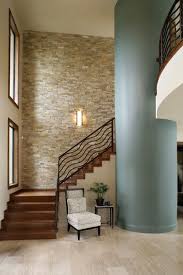 This Color Brick In Bedroom Possibly Carried Into Bathroom Indoor Stone Wall Modern Staircase Stone Walls Interior