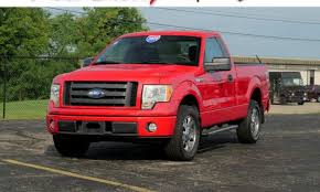 Image result for Flame Red 2009 Jeep