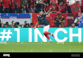 Frances Theo Hernandez celebrates his first-half goal against Morocco with  a knee slide in a World Cup semifinal football match at Al-Bayt Stadium in  Al Khor, Qatar, on Dec. 14, 2022. (Kyodo)==Kyodo
