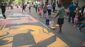 Home nc charlotte fine art artists sculptors. It S A Testament To The City Artists Gather To Fix Damages On Black Lives Matter Street Painting In Uptown Charlotte King5 Com