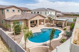 Horizons residential care center awards & accolades. Tropical Pool Landscape With Travertine Deck Custom Pergola In Mesa Garden Phoenix By Desert Horizon Nursery Houzz