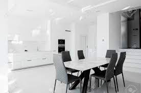 Maybe you would like to learn more about one of these? Luxurious Modern Dining Room With White Table Black Chairs And Stock Photo Picture And Royalty Free Image Image 147457992