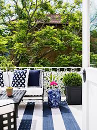 Greek and roman decor, by its very nature, suggests an air of ancient extravagance that won't be remiss in your bedroom. New Orleans Blue And White Garden Terrace Stripes Greek Key Boxwoods Blue Patio Decor Greek Patio Backyard Decor