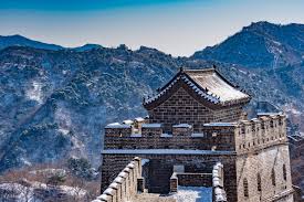 Great Wall across green mountains