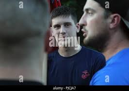 U.S. Army Sgt. William Miles with the 132nd Military Police Company, South  Carolina Army National Guard, is welcomed home by his wife Holy Miles and  son Conner, at the unit's welcome home