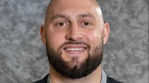 Coach suspended for saying he'd like to have dinner with Hitler