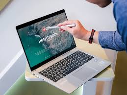 Free Man Using Hp Elitebook Mockup Hp Elitebook Mockup Website Template Design