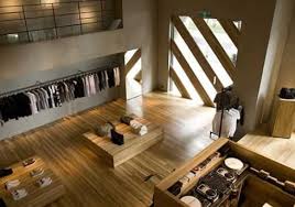 I Love The Concrete Walls And Shiny Oak Flooring It Screams Industrial And Modern Exclusive And Sophistica Retail Interior Retail Design Retail Store Design