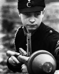This is the depiction of a Hitlerjugend child soldier as part of the  Volkssturm in the battle of Berlin in May 1945. I actually made this one  years ago inspired by watching