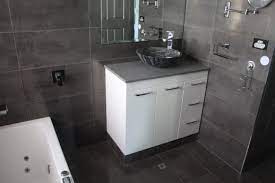 Actually tiles are not horizontal or vertical, they are just rectangular and you can use them either way. Which Way To Get Laid Horizontal V Vertical Small Bathroom Renovations Perth Small Bathrooms Wa Specialists