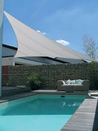Sonnensegel Pool Sitzecke Gabionen Mauer Modern A Swimming Pool Is The Dream Of Many Garden Owners Because It Serves Pool Shade Sun Sail Shade Shade Sail