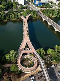 The bridge is found near the heart of downtown austin, and is about 200 feet to the east of the lamar boulevard bridge. Pfluger Bridge In Austin Texas Built By Jay Reese Contractors Inc Photo By Jay Reese Completed In 2001 Pedestrian Bridge Ramps Architecture Town Lake
