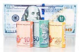 Airports, hotels and banks charge high commission fees for exchange and are not very favourable. Close Up Of Malaysia Ringgit Currency Note Against Us Dollar 1114260 Stock Photo At Vecteezy