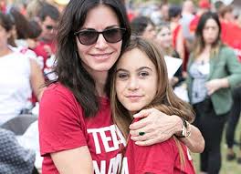 Courteney cox posted a photo of what she wore to her first formal alongside a picture of what daughter coco courteney cox shows 'times have changed' with pic of daughter's 1st formal dance. Courteney Cox S Daughter Coco Wears Her Mom S Dress 21 Years Later Purewow
