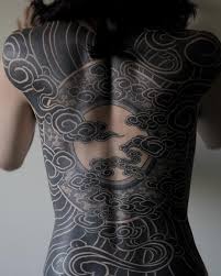 But no matter how the tattooist approaches blackout, one thing is certain: These Striking Solid Black Tattoos Will Make You Want To Go All In Solid Black Tattoo Tattoos Black Tattoos
