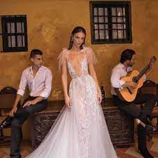 Beautiful spring garden wedding reception with lights and greenery. 29 Best Garden Wedding Dresses Of 2021