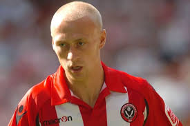 Former Sheffield United, Doncaster Rovers and Barnsley star David Cotterill  hanging up his boots
