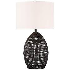 A table lamp for the bedroom helps illuminate for reading and task work but is softer than a desk lamp. Lite Source Ivette Black Woven Rattan Table Lamp 87p71 Lamps Plus