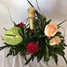 Provence and rosé go hand in hand. 18 Rose Vase And Wine Hastings Flowermart