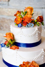 Orange And Blue With A Spot Of Yellow Orange Wedding Cake Wedding Cakes Blue Popular Wedding Colors