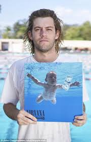 The baby featured on nirvana's nevermind album cover recreated the iconic shot 25 years later this isn't the first time elden has attempted to recreate the beloved album cover. Hero Cover Nevermind By Nirvana Revived It 25 Years Later Let S See How Baby Looks Now Page 1