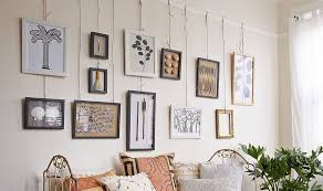 Hanging Art Has Never Been Easier Hanging Wall Art Hanging Pictures On The Wall Gallery Wall Layout