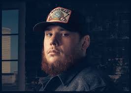 Luke Combs Shares 'Lovin' On You' Video Featuring Young Versions Of  Himself, Wife