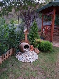 Blumentopfe Salvabrani Recycling Garten Pinterest Garten Gartenlandschaft Blumentopfe Gart Stone Flower Beds Rock Garden Landscaping Front Yard