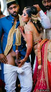 Image of bride is naked and with squirting, indian man pop his dick out  from pant infront of bride in front of groom at the wedding where all tha  attendees are present -